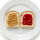 Two slices on white bread, one has peanut butter and the other has jelly.